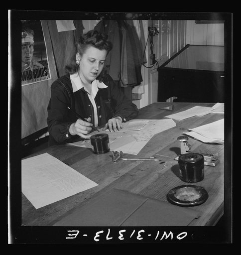Washington, D.C. Preparing an advisory forecast at the U.S. Weather Bureau. Weather data being plotted on sectional manuscript maps