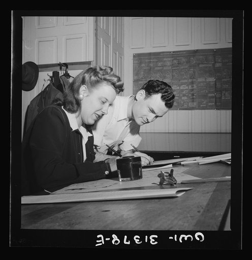 Washington, D.C. Preparing an advisory forecast at the U.S. Weather Bureau. Unit supervisor checking data with the plotter of accuracy