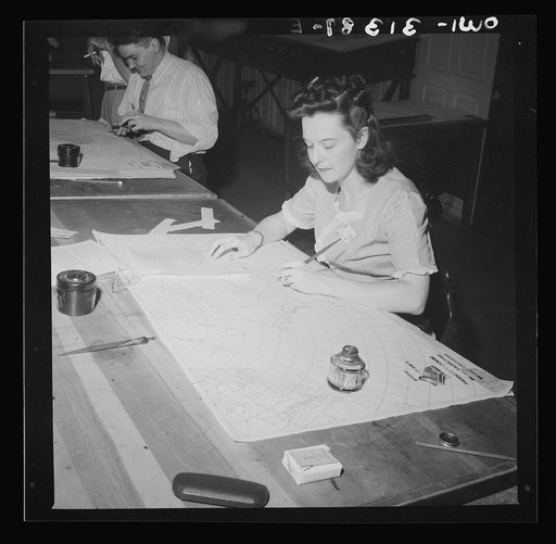 Washington, D.C. Preparing an advisory forecast at the U.S. Weather Bureau. Preparing an auxiliary weather map which reveals upper atmospheric conditions