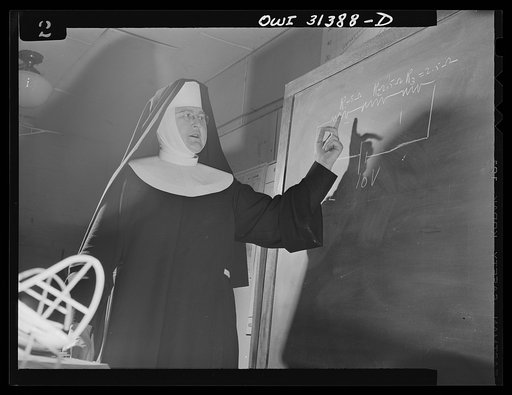 Washington, D.C. Sister Aquinas, "flying nun,"  teaching a class in aeronautics at Catholic University