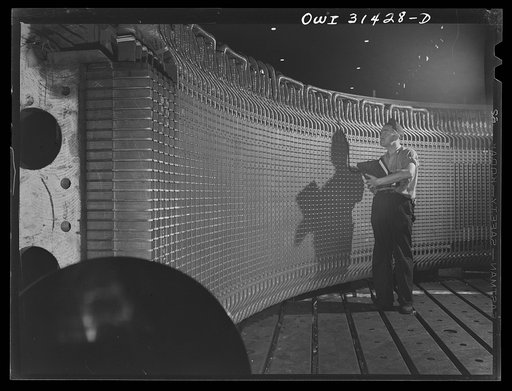 Philadelphia, Pennsylvania. Stator frame of the 30,000 kilowatt generator which Westinghouse Electric Company is manufacturing for the Watts Bar Dam of Tennesse Valley Authority (TVA). It is lined with thousands of armature coils, and over 100,000 sheets of laminated iron which serve to conduct the 