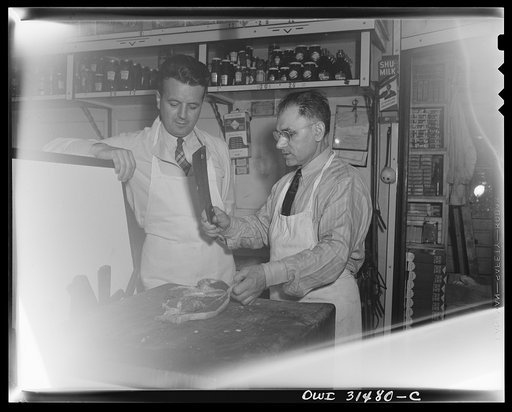 A scene from the filming of "Black Marketing," a motion picture produced by the U.S. Office of War Information (OWI) and released August 19, 1943