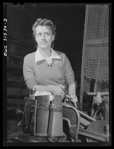 Untitled photo, possibly related to: Oswego, New York. Leona Hilliday, powersaw operator at the Ames iron works