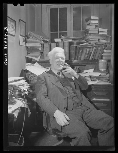 Untitled photo, possibly related to: Oswego, New York. Mr. Waterbury, publisher and part owner of Oswego's afternoon daily, the Palladium Times