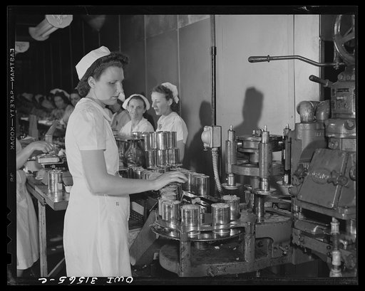 Cincinnati, Ohio. Preparing canned pork (Russian: "svinaia tushonka") for lend-lease shipment to the USSR at the Kroger grocery and baking company. Geneva Stumper, ex-housewife, whose brother is in the U.S. Army. She is in charge of the machine that places lids on the cans
