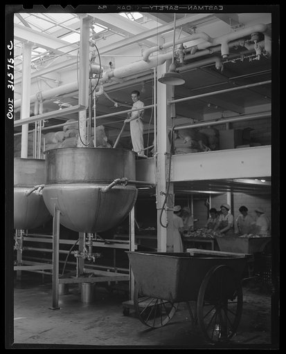 Untitled photo, possibly related to: Cincinnati, Ohio. Preparing canned pork (Russian: "svinaia tushonka") for lend-lease shipment to the USSR at the Kroger grocery and baking company. Pot boilers where pork is treated for twenty percent pre-shrinkage before being canned