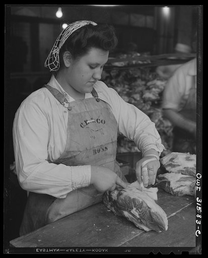 Cincinnati, Ohio. Preparing canned pork (Russian: "svinaia tushonka") for lend-lease shipment to the USSR at the Kroger grocery and baking company. Maudeen Hood, age nineteen, removing fat from pork. She used to do housework, and her husband is in the United States Army