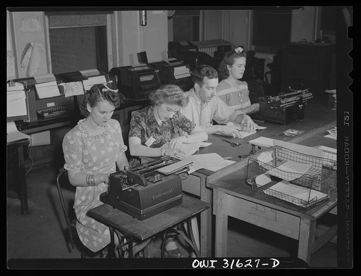 Washington, D.C. Preparing an advisory forecast at the U.S. Weather Bureau. Weather forecasts and advices are coded for transmission to military and civilian centers for war activity