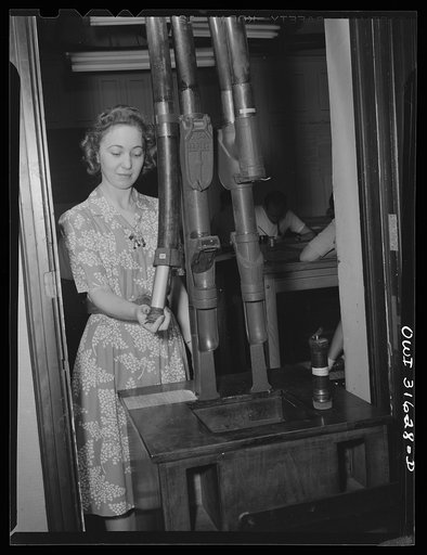 Untitled photo, possibly related to: Washington, D.C. Preparing an advisory forecast at the U.S. Weather Bureau. Completed weather information is sent by pneumatic tubes to a communication center for transmittal to various military and civilian centers for war activity use