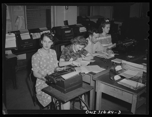 Untitled photo, possibly related to: Washington, D.C. Preparing an advisory forecast at the U.S. Weather Bureau. Weather forecasts and advices are coded for transmission to military and civilian centers for war activity