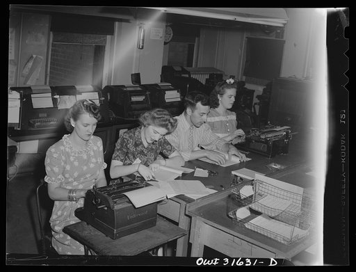 Untitled photo, possibly related to: Washington, D.C. Preparing an advisory forecast at the U.S. Weather Bureau. Weather forecasts and advices are coded for transmission to military and civilian centers for war activity