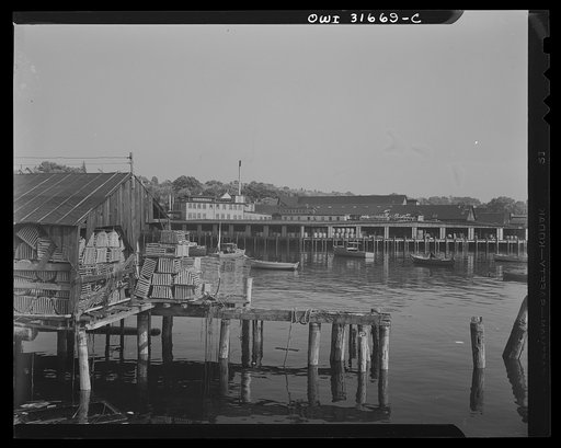 Lobster traps stacked in an old net house. Gloucester, Massachusetts