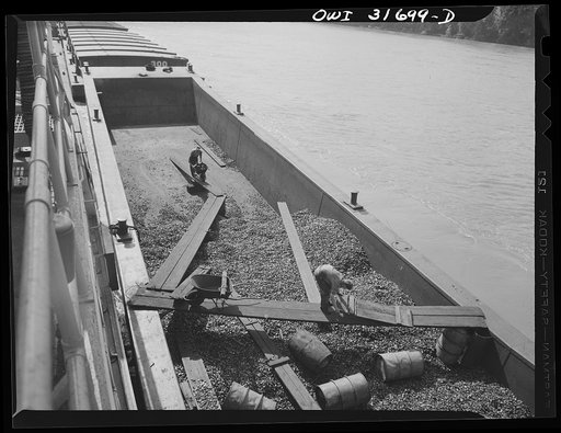 Gallipolis, Ohio. A barge containing coal, which is necessary for firing boilers on the towboat