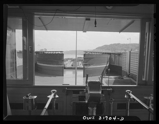 Gallipolis, Ohio. The gate locks opening for a towboat to join the double locking as seen from the Charles T. Campbell, a towboat