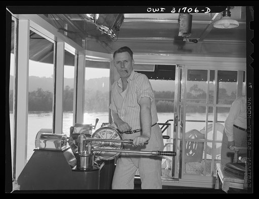 The captain of the towboat Ernest T. Weir going down the Ohio River from Gallipolis