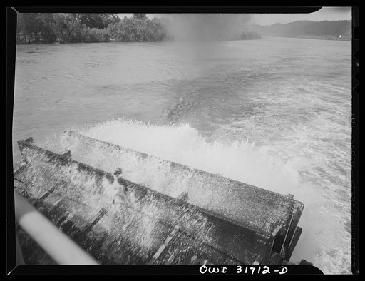 The paddle of a towboat going down the Ohio River