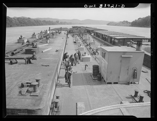 Gallipolis, Ohio. The crew of the Charles T. Campbell, a towboat, carrying tow ropes