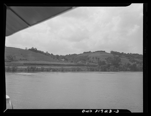 A train on the Ohio River bank as seen from the Ernest T. Weir on the way to Cincinnati down the Ohio River