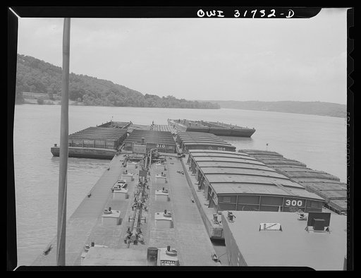 Shifting a barge's position in the tow of the towboat Ernest T. Weir going down the Ohio River on th way to Cincinnati