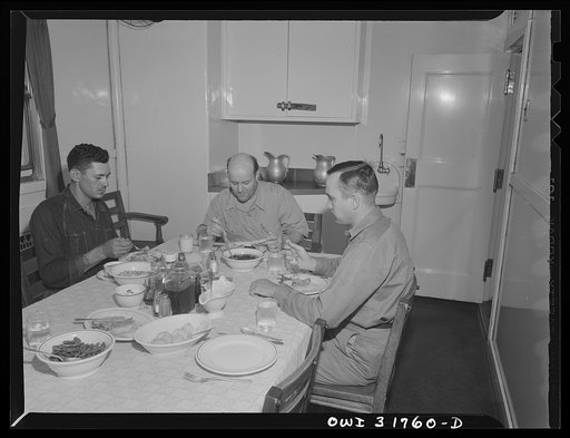 The pilot and mates eating dinner on the towboat Ernest T. Weir going down the Ohio River to Cincinnati