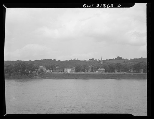 A river town about fifty miles from Cincinnati as seen from the towboat Ernest T. Weir going down the Ohio River to Cincinnati
