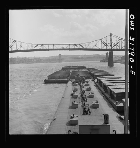 Cincinnati (vicinity), Ohio. The Cincinnati bridge as seen from the towboat Ernest T. Weir going down the Ohio River