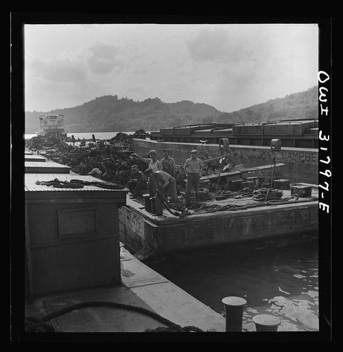 Untitled photo, possibly related to: Lashing barges together on the Ohio River
