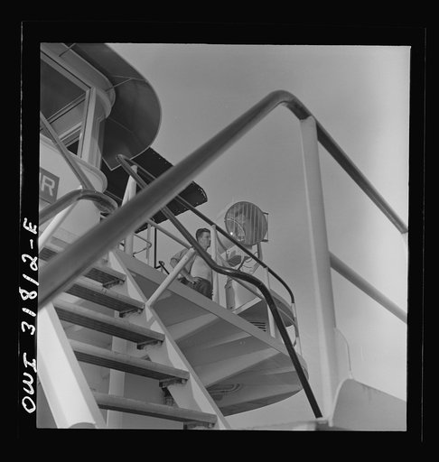 A searchlight next to the pilot house on the towboat Ernest T. Weir going down the Ohio River to Cincinnati