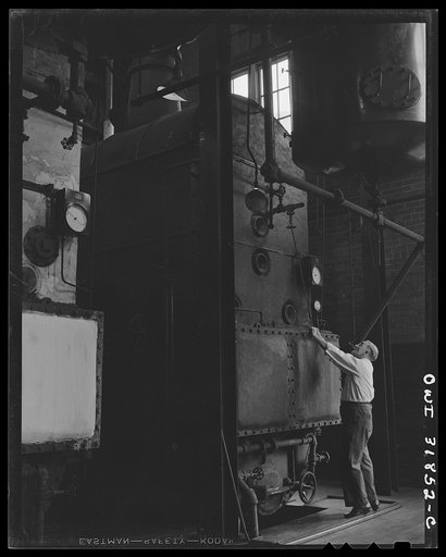 Untitled photo, possibly related to: Proctor [i.e. Procter] and Gamble Distributing Company, Cincinnati, Ohio. Checking pressure during the glycerine distilling process