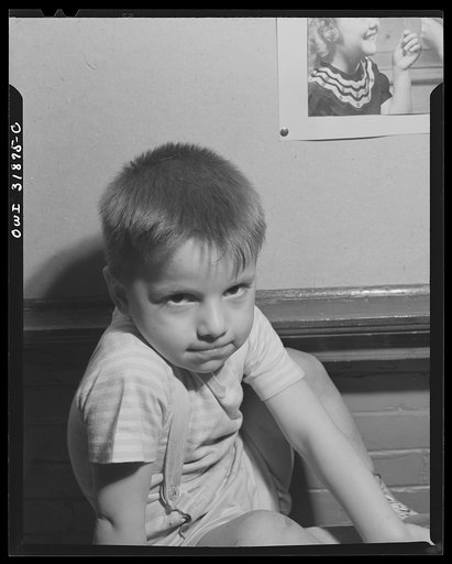 New Britain, Connecticut. A child care center, opened September 15, 1942, for thirty children, age two to five, of mothers engaged in war industry. The hours are 6:30 a.m. to 6 p.m., six days per week. Portrait of child at the center