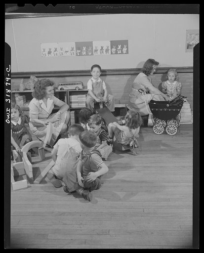 Untitled photo, possibly related to: New Britain, Connecticut. A child care center, opened September 15, 1942, for thirty children, age two to five, of mothers engaged in war industry. The hours are 6:30 a.m. to 6 p.m., six days per week. Playtime in the child care center