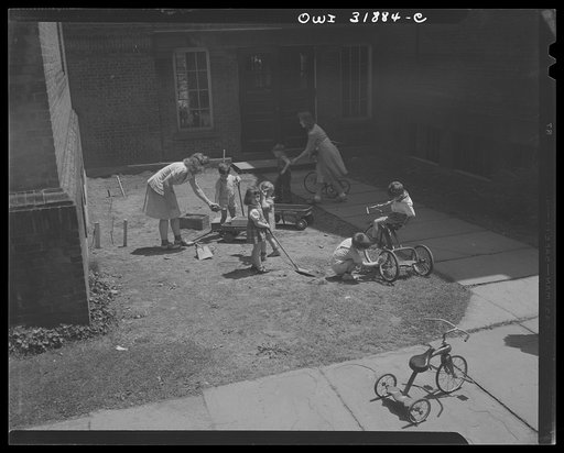 New Britain, Connecticut. A child care center, opened September 15, 1942, for thirty children, age two to five, of mothers engaged in war industry. The hours are 6:30 a.m. to 6 p.m. six days per week. In their daily outdoor play, children have wheel toys to ride and pull, climbing, digging and swing