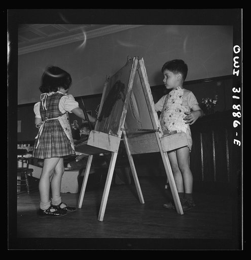 New Britain, Connecticut. A child care center, opened September 15, 1942, for thirty children, age two to five, of mothers engaged in war industry. The hours are 6:30 a.m. to 6 p.m. six days per week. Children painting and coloring