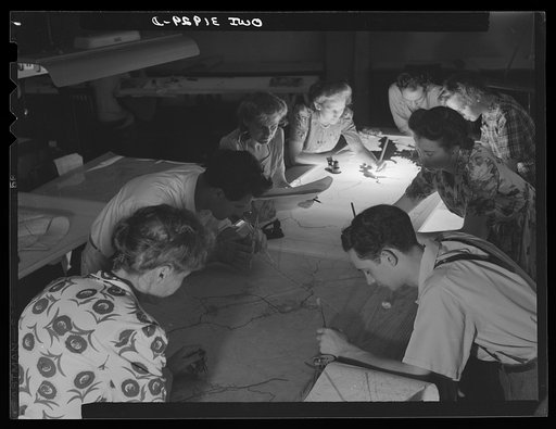 Washington, D.C. Workers of the U.S. Geological Survey, Alaska branch, making the final drafting of an air navigation chart for the U.S. Army air forces