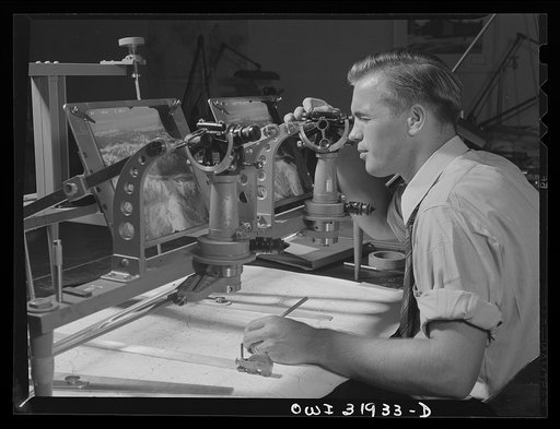 Untitled photo, possibly related to: Washington, D.C. John Zydik, an employee of the U.S. Geological Survey, Alaska branch, using the double-photo-alidade to make a topographic map