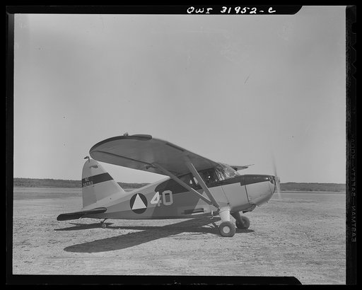 Untitled photo, possibly related to: Bar Harbor, Maine. Civil Air Patrol base headquarters of coastal patrol no. 20. Patrol plane ready to take off for dusk patrol