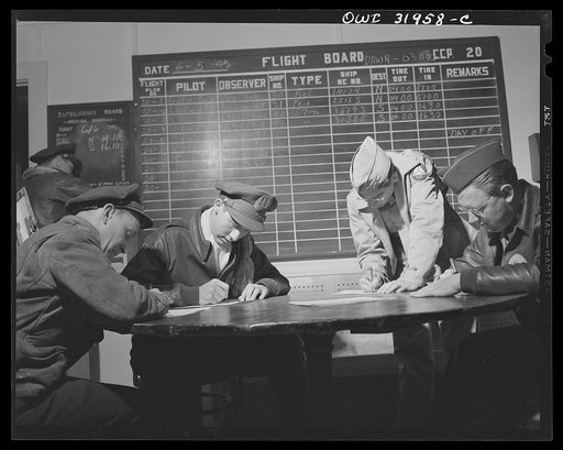 Bar Harbor, Maine. Civil Air Patrol base headquarters of coastal patrol no. 20. Dawn patrol flyers and observers making routine reports before starting on patrol