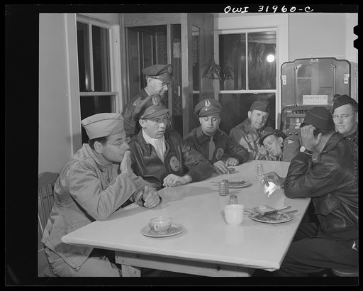 Bar Harbor, Maine. Civil Air Patrol base headquarters of coastal patrol no. 20. Dawn patrol warming up in the canteen before taking off at 4 a.m.