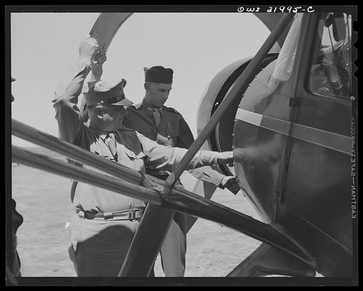 Bar Harbor, Maine. Civil Air Patrol base headquarters of coastal patrol no. 20. Major James B. King, base commander, making weekly inspection