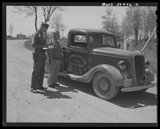 Bar Harbor, Maine. Civil Air Patrol base headquarters of coastal patrol no. 20. Guards clearing a construction truck at the airport gate