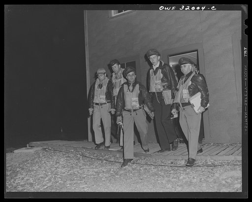 Bar Harbor, Maine. Civil Air Patrol base headquarters of coastal patrol no. 20. Pilots and observers leaving the intelligence room to take off for dawn patrol at 4 a.m.