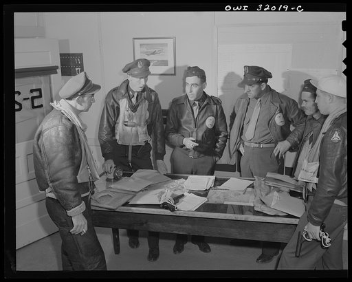 Untitled photo, possibly related to: Bar Harbor, Maine. Civil Air Patrol base headquarters of coastal patrol no. 20. Pilots and observers getting instruction before taking off on dawn patrol