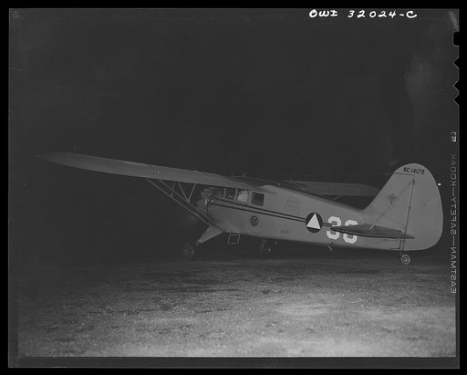Bar Harbor, Maine. Civil Air Patrol base headquarters of coastal patrol no. 20. Taking off on dawn patrol