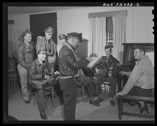 Bar Harbor, Maine. Civil Air Patrol base headquarters of coastal patrol no. 20. The officer of the day interrupting music to issue flight instructions