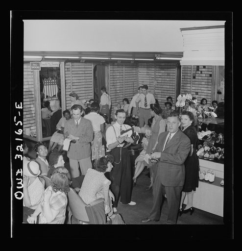 Washington, D.C. A busy shoe store on the last day on which war ration shoe coupon seventeen may be used