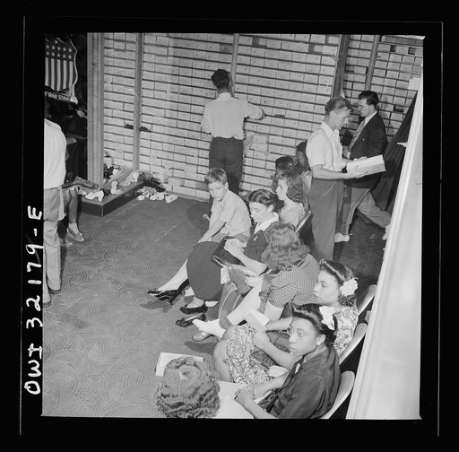 Washington, D.C. A crowded shoe store on the last day on which war ration shoe coupon seventeen may be used
