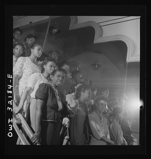 Untitled photo, possibly related to: Washington, D.C. Part of a crowd waiting their turn in a shoe store on the last day on which war ration shoe coupon seventeen may be used