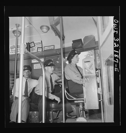 Washington, D.C. An instructor of the Capitol Transit Company teaching a woman to operate a one-man streetcar