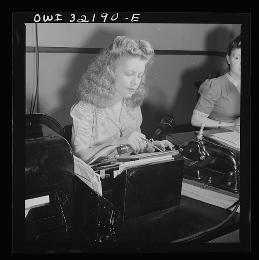 Untitled photo, possibly related to: Washington, D.C. Jean Smith sending a Western Union telegram on the teleprinter to New York