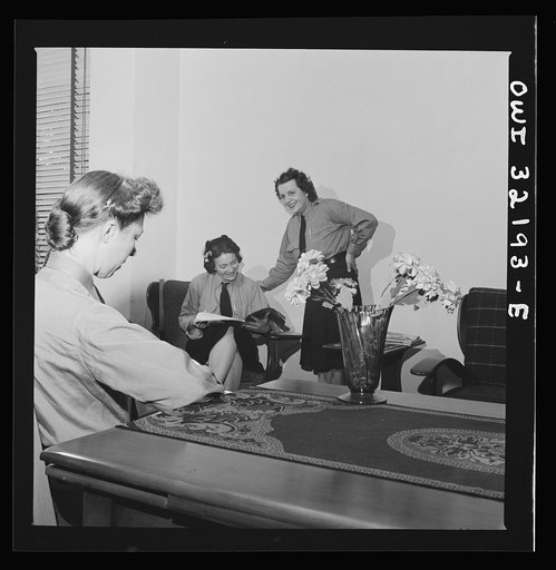 Untitled photo, possibly related to: Washington, D.C. Women streetcar and bus operators relaxing between their runs